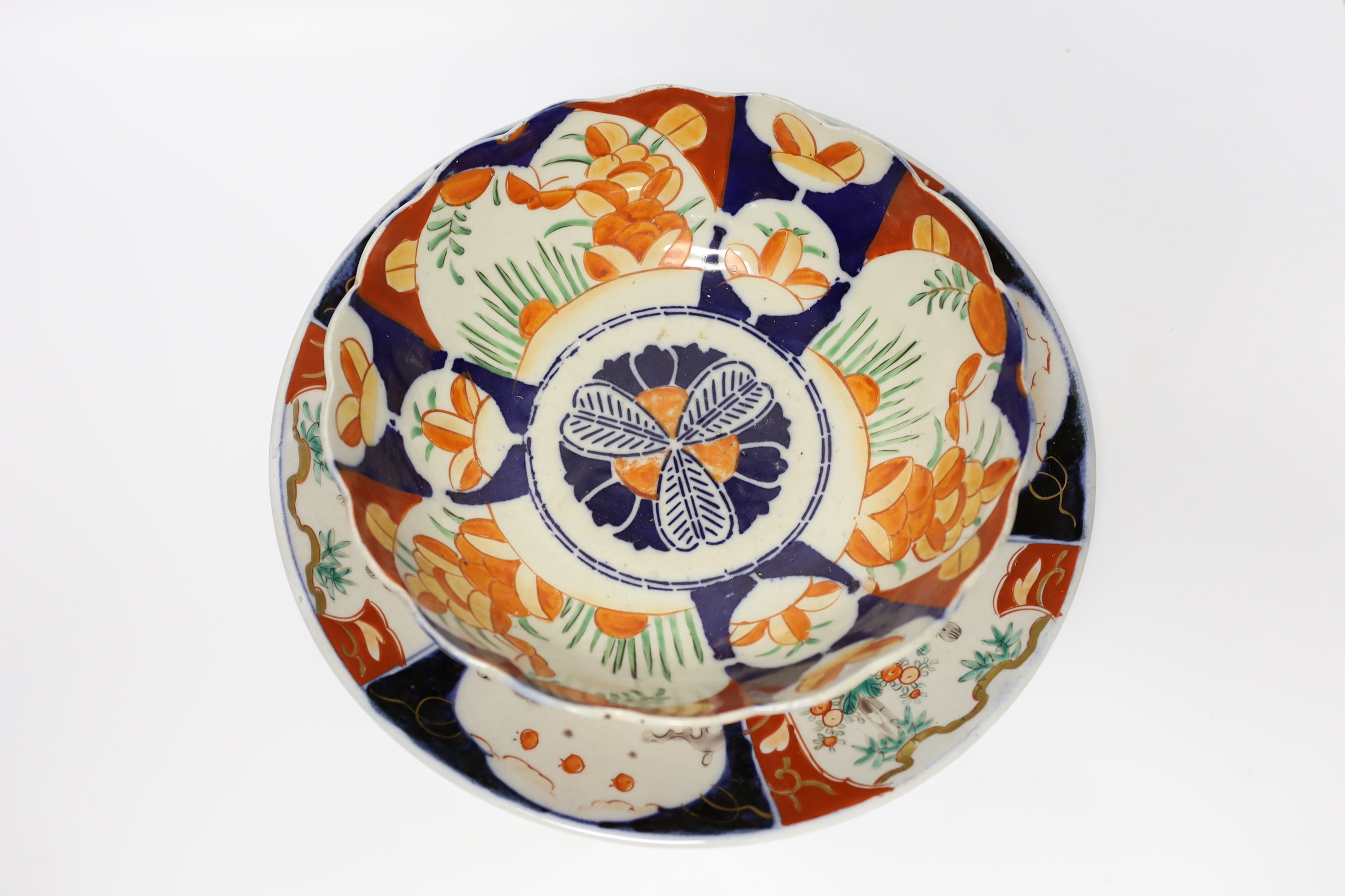 A group of Japanese Imari and kutani together with a Worcester blue and white saucer and a Chinese famille verte teabowl